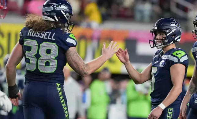 Seattle Seahawks kicker Jason Myers (5) celebrates with fullback Brady Russell (38) after making a field goal during the second half of the NFL Super Bowl 60 football game, Sunday, Feb. 8, 2026, in Santa Clara, Calif. (AP Photo/Matt Slocum)