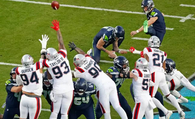 Seattle Seahawks placekicker Jason Myers, top right, scores on a field goal against the New England Patriots in the second quarter of the NFL Super Bowl 60 football game in Santa Clara, Calif., Sunday, Feb. 8, 2026. (Santiago Mejia/San Francisco Chronicle via AP)