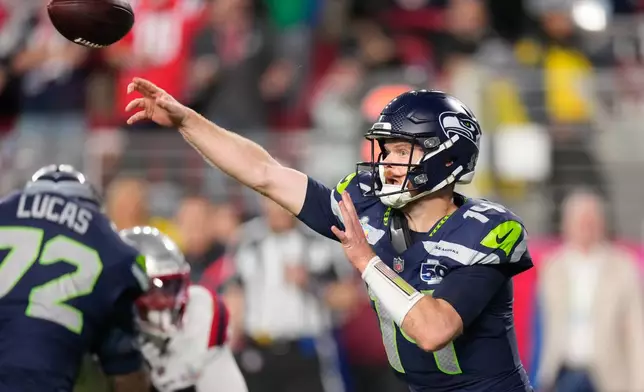 Seattle Seahawks quarterback Sam Darnold throws a pass during the second half of the NFL Super Bowl 60 football game against the New England Patriots, Sunday, Feb. 8, 2026, in Santa Clara, Calif. (AP Photo/Mark J. Terrill)