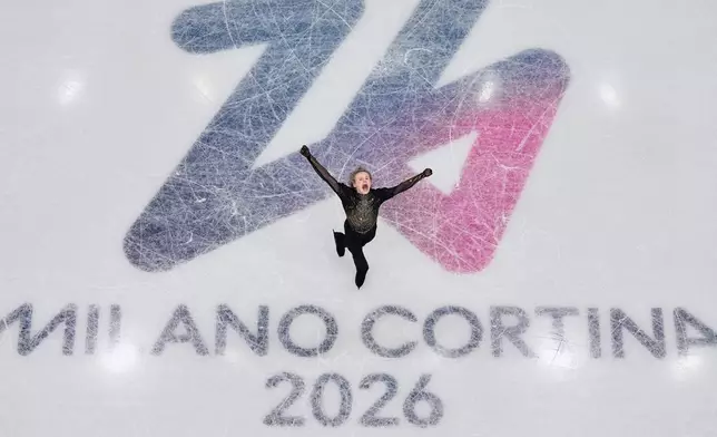 Ilia Malinin of the United States wobbles while competing during the figure skating men's team event at the 2026 Winter Olympics, in Milan, Italy, Sunday, Feb. 8, 2026. (AP Photo/Bernat Armangue)