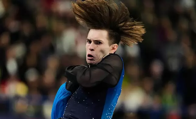 Mikhail Shaidorov of Kazakhstan competes during the men's free skate program in figure skating at the 2026 Winter Olympics, in Milan, Italy, Friday, Feb. 13, 2026. (AP Photo/Natacha Pisarenko)