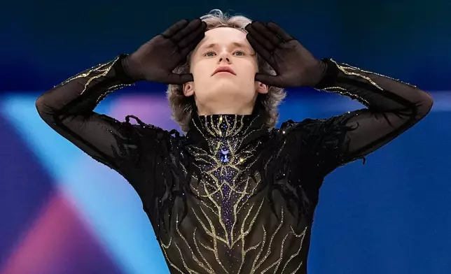 Ilia Malinin of the United States competes during the men's free skate program in figure skating at the 2026 Winter Olympics, in Milan, Italy, Friday, Feb. 13, 2026. (AP Photo/Ashley Landis)