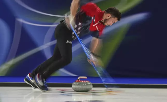 United States' Korey Dropkin competes against Switzerland during the mixed doubles round robin phase of the curling competition, at the 2026 Winter Olympics, in Cortina d'Ampezzo, Italy, Thursday, Feb. 5, 2026. (AP Photo/Fatima Shbair)
