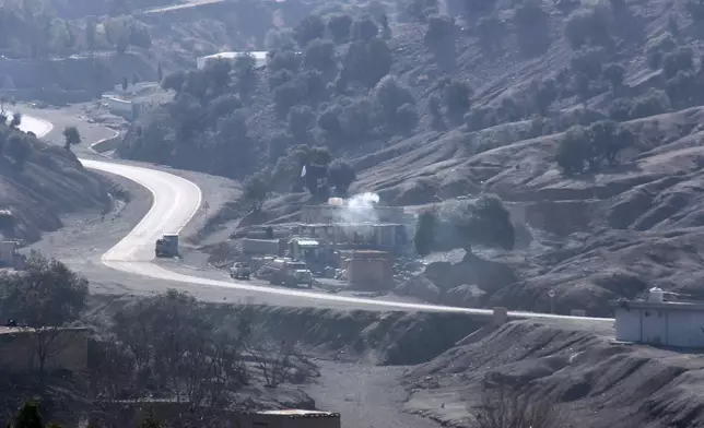 Smoke rises after an explosion at a border post on the Afghan side of the Ghulam Khan crossing with Pakistan in Khost province, Afghanistan, Friday, Feb. 27, 2026. (AP Photo/Saifullah Zahir)