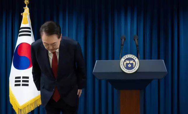 FILE - South Korean President Yoon Suk Yeol bows at the end of his announcement at the presidential office in Seoul, South Korea, on Dec. 7, 2024. (South Korean Presidential Office/Yonhap via AP, File)