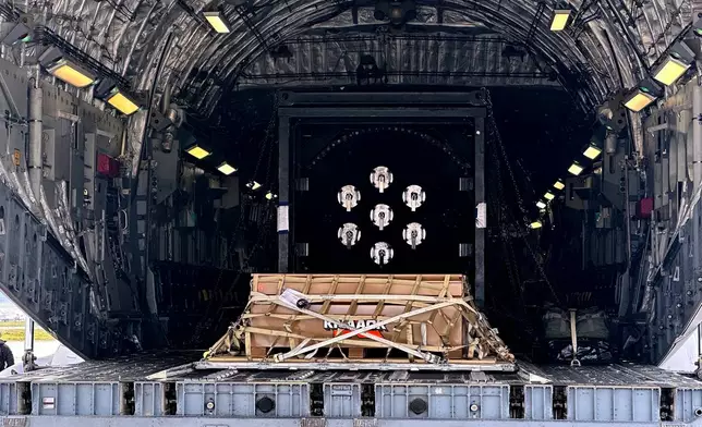 A Valar Atomics microreactor is seen on a C-17 aircraft, without nuclear fuel, at March Air Reserve Base, Calif., Sunday, Feb. 15, 2026. The reactor was transported from March Air Reserve Base to Hill Air Force Base in Utah. (AP Photo/Matthew Daly)