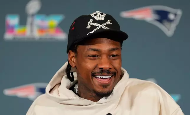 New England Patriots wide receiver Stefon Diggs talks to the media during a news conference Wednesday, Feb. 4, 2026, in Santa Clara, Calif., ahead of the Super Bowl 60 NFL football game between the Seattle Seahawks and the New England Patriots. (AP Photo/Charlie Riedel)