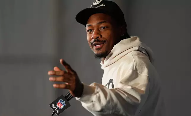 New England Patriots wide receiver Stefon Diggs talks to the media during a news conference Wednesday, Feb. 4, 2026, in Santa Clara, Calif., ahead of the Super Bowl 60 NFL football game between the Seattle Seahawks and the New England Patriots. (AP Photo/Charlie Riedel)