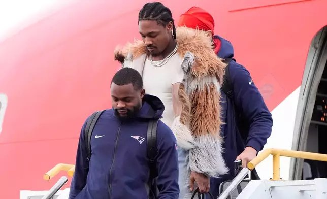 New England Patriots wide receiver Stefon Diggs and wide receiver Kayshon Boutte arrive on Sunday, Feb. 1, 2026, in San Jose, Calif. ahead of the Super Bowl 60 football game between the Seattle Seahawks and the New England Patriots. (AP Photo/Charlie Riedel)