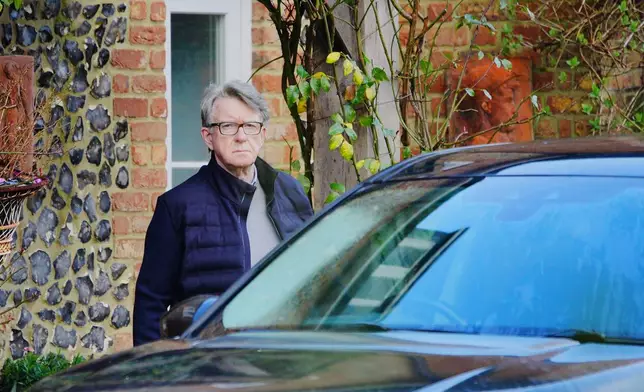 Peter Mandelson leaving his home in Wiltshire, England, Friday, Feb. 20, 2026. (Ben Birchall/PA via AP)