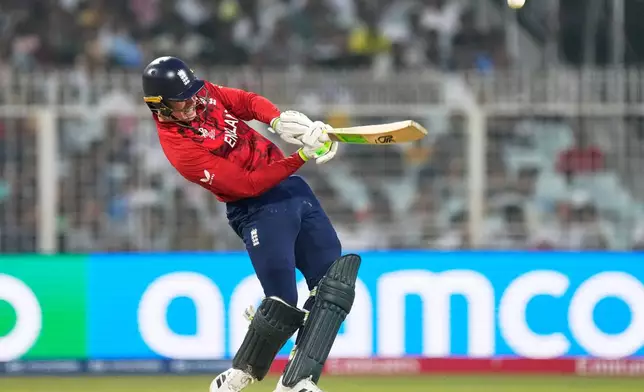 England's Tom Banton plays a shot during the T20 World Cup cricket match between England and Scotland in Kolkata, India, Saturday, Feb. 14, 2026. (AP Photo/Bikas Das)