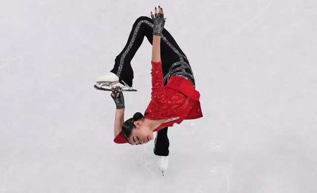 Adeliia Petrosian of Individual Neutral Athletes competes during the women's short program figure skating at the 2026 Winter Olympics, in Milan, Italy, Tuesday, Feb. 17, 2026. (AP Photo/Bernat Armangue)