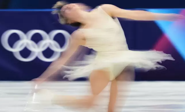 Alysa Liu of the United States competes during the women's short program figure skating at the 2026 Winter Olympics, in Milan, Italy, Tuesday, Feb. 17, 2026. (AP Photo/Francisco Seco)