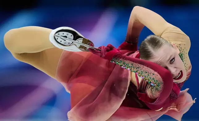 Niina Petrokina of Estonia competes during the women's short program figure skating at the 2026 Winter Olympics, in Milan, Italy, Tuesday, Feb. 17, 2026. (AP Photo/Natacha Pisarenko)