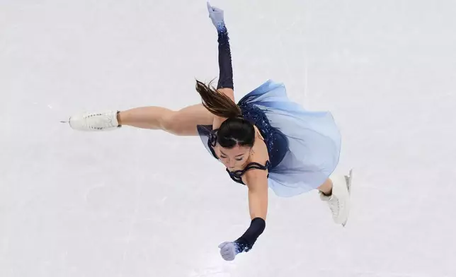 Kaori Sakamoto of Japan competes during the women's short program figure skating at the 2026 Winter Olympics, in Milan, Italy, Tuesday, Feb. 17, 2026. (AP Photo/Bernat Armangue)
