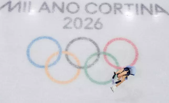 Kaori Sakamoto of Japan competes during the women's short program figure skating at the 2026 Winter Olympics, in Milan, Italy, Tuesday, Feb. 17, 2026. (AP Photo/Bernat Armangue)