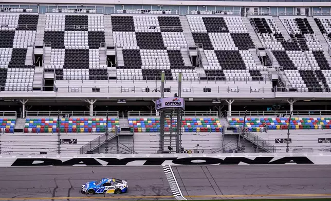 Driver Carson Hocevar works on the track during a NASCAR Daytona 500 practice, Wednesday, Feb. 11, 2026, in Daytona, Fla. (AP Photo/Mike Stewart)