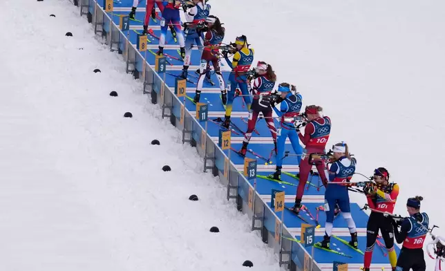 Athletes compete in the women's 4x6-kilometer relay biathlon race at the 2026 Winter Olympics in Anterselva, Italy, Wednesday, Feb. 18, 2026. (AP Photo/Mosa'ab Elshamy)