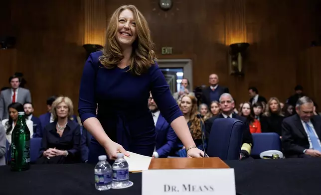 Dr. Casey Means takes her seat at the start of a Senate Health, Education Labor and Pension Committee Conformation Hearing for U.S. Surgeon General on Capitol Hill on Wednesday, Feb. 25, 2026, in Washington. (AP Photo/Tom Brenner)
