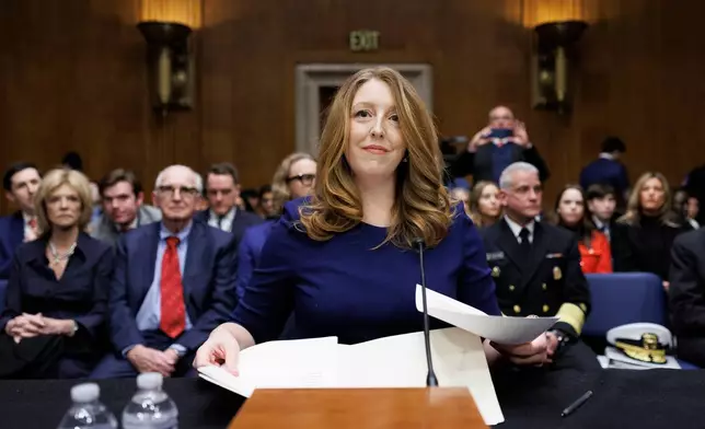 Dr. Casey Means takes her seat at the start of a Senate Health, Education Labor and Pension Committee Conformation Hearing for U.S. Surgeon General on Capitol Hill on Wednesday, Feb. 25, 2026, in Washington. (AP Photo/Tom Brenner)