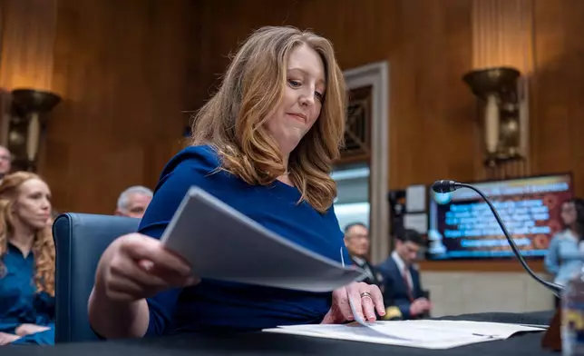 Wellness influencer and entrepreneur Dr. Casey Means takes her seat before the Senate health committee as she seeks approval to be U.S. surgeon general, at the Capitol in Washington, Wednesday, Feb. 25, 2026. (AP Photo/J. Scott Applewhite)