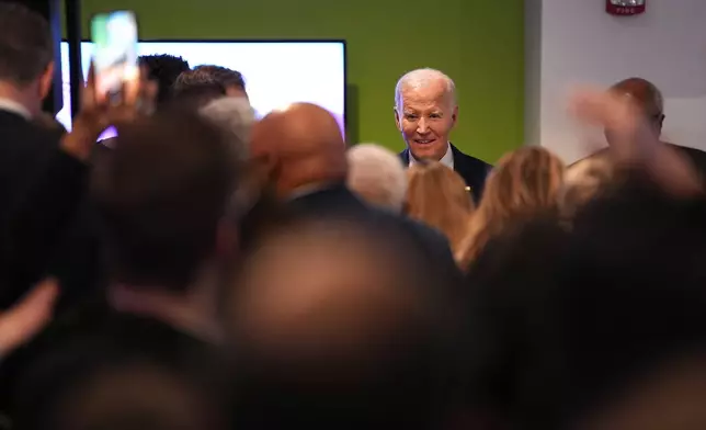 Former President Joe Biden interacts with the crowd after speaking to the South Carolina Democratic Party on Friday, Feb. 27, 2026, in Columbia, S.C. (AP Photo/Matt Kelley)