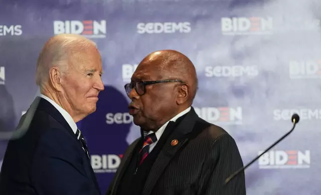 Former President Joe Biden embraces Rep. Jim Clyburn, D-S.C., before speaking to the South Carolina Democratic Party on Friday, Feb. 27, 2026, in Columbia, S.C. (AP Photo/Matt Kelley)