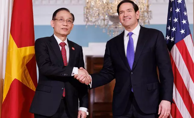 U.S. Secretary of State Marco Rubio meets with Vietnamese Foreign Minister Le Hoai Trung at the U.S. Department of State on Thursday, Feb. 19, 2026, in Washington. (AP Photo/Tom Brenner)