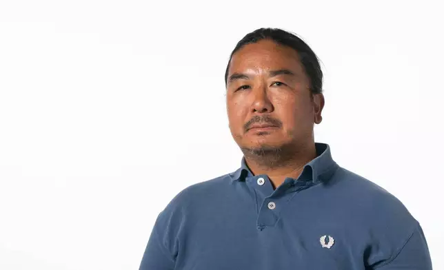 This undated photo shows Star Tribune photographer Richard Tsong-Taatarii in Minneapolis. (Alex Kormann/Star Tribune via AP)