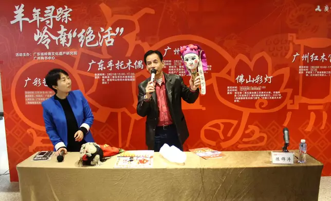 Mr. Chan Kam To introduced the culture of hand puppet Cantonese opera at a public lecture. Photo source: Shot and shared by Mr. Choi Kai Kwong, a researcher of bamboo theatre culture in Hong Kong