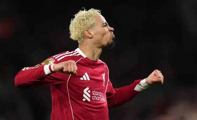 Liverpool's Hugo Ekitike celebrates after scoring his side's first goal during the English Premier League soccer match between Liverpool and Newcastle in Liverpool, England, Saturday, Jan. 31, 2026.(AP Photo/Jon Super)