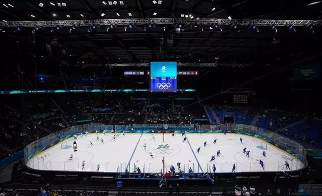 France and Italy players take part in the pregame skate before playing a women's hockey game at the Milano Santagiulia ice hockey arena, at the Milan Cortina Winter Olympics, in Milan, on Thursday, Feb. 5, 2026. (Darryl Dyck /The Canadian Press via AP)