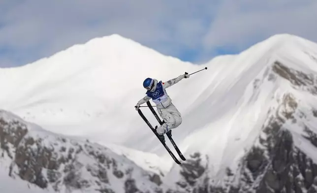 China's Eileen Gu practices before the women's freestyle skiing slopestyle qualifications at the 2026 Winter Olympics, in Livigno, Italy, Saturday, Feb. 7, 2026. (AP Photo/Lindsey Wasson)
