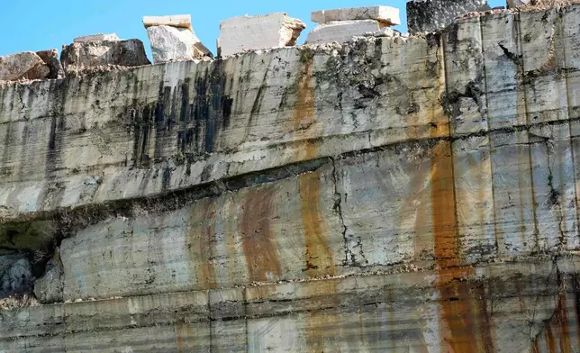 A wall of sectioned travertine is seen at the Degemar quarry near Tivoli, Italy, on Friday, Feb. 13, 2026, where 17th-century Baroque architect Gian Lorenzo Bernini selected travertine for the colonnade of St. Peter's Square. (AP Photo/Gregorio Borgia)
