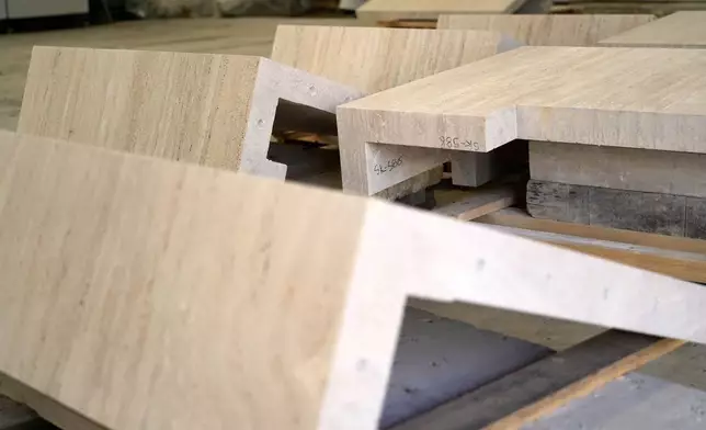 Sections of travertine that will be used to adorn the tower of the new Manhattan Mormon temple in New York City are seen inside the Mariotti Carlo SpA stonecutting firm near Tivoli, Italy, 35 kilometers east of Rome, on Friday, Feb. 13, 2026. (AP Photo/Gregorio Borgia)
