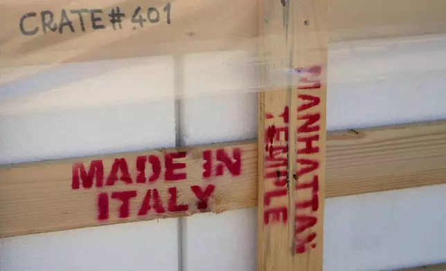 Pieces of travertine that will be used to adorn the tower of the new Manhattan temple in New York City are wrapped for shipping at the Mariotti Carlo SpA stonecutting firm near Tivoli, Italy, 35 kilometers east of Rome, on Friday, Feb. 13, 2026, (AP Photo/Gregorio Borgia)