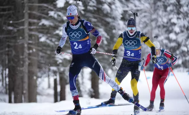 Eric Perrot, of France, competes in the men's 4x7.5-kilometer relay biathlon race at the 2026 Winter Olympics in Anterselva, Italy, Tuesday, Feb. 17, 2026. (AP Photo/Andrew Medichini)
