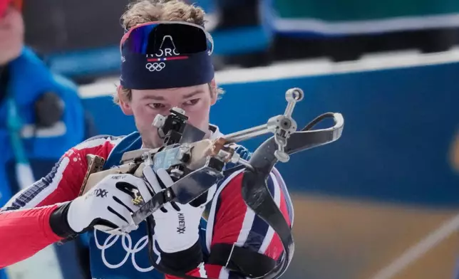 Sturla Holm Laegreid of Norway competes during the biathlon Men's 12.5km pursuit at the 2026 Winter Olympics, in Anterselva, Italy, Sunday, Feb. 15, 2026. (AP Photo/Christophe Ena)