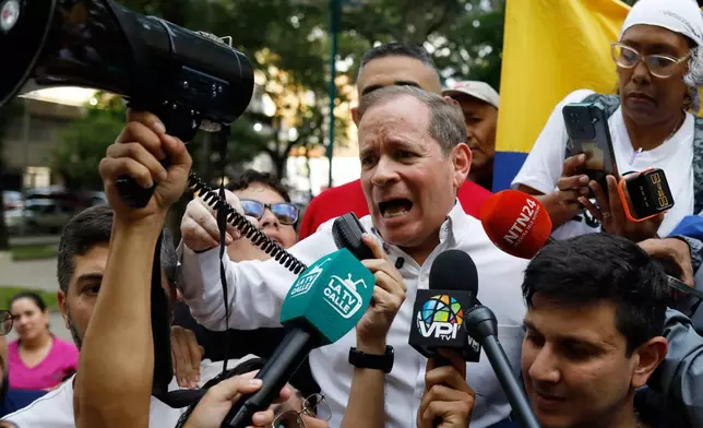 Opposition leader Juan Pablo Guanipa speaks after his release from prison in Caracas, Venezuela, Sunday, Feb. 8, 2026. (AP Photo/Cristian Hernandez)