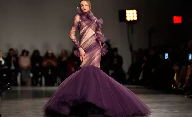 A model walks the runway during the Christian Siriano Fall/Winter 2026 fashion show as part of New York Fashion Week, Thursday, Feb. 12, 2026, in New York. (Photo by Charles Sykes/Invision/AP)