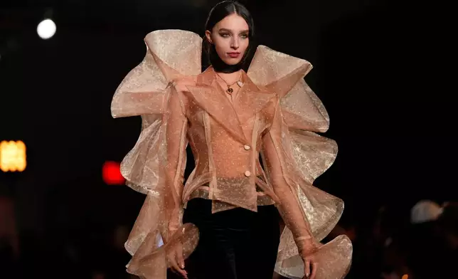 A model walks the runway during the Christian Siriano Fall/Winter 2026 fashion show as part of New York Fashion Week on Thursday, Feb. 12, 2026, in New York. (Photo by Charles Sykes/Invision/AP)