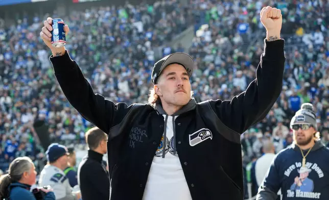 Seattle Seahawks wide receiver Jake Bobo arrives for the team's NFL football Super Bowl 60 celebration at Lumen Field, Wednesday, Feb. 11, 2026, in Seattle. (AP Photo/Stephen Brashear)