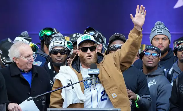 Seattle Seahawks wide receiver Cooper Kupp speaks during the team's NFL football Super Bowl 60 celebration at Lumen Field, Wednesday, Feb. 11, 2026, in Seattle. (AP Photo/Stephen Brashear)