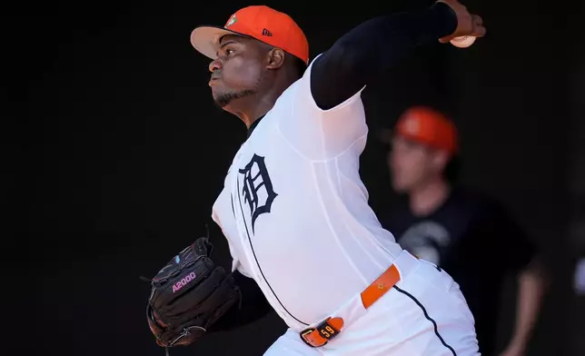Detroit Tigers pitcher Framber Valdez throws during workouts at spring training baseball, Thursday, Feb. 19, 2026, in Lakeland. (AP Photo/Mike Stewart)