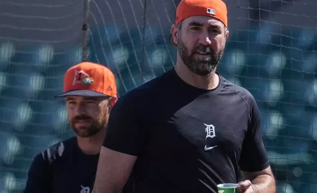 Detroit Tigers pitcher Justin Verlander moves to the dugout during workouts at spring training baseball, Friday, Feb. 20, 2026, in Lakeland. (AP Photo/Mike Stewart)