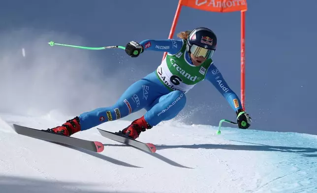 Italy's Sofia Goggia speeds down the course during an alpine ski, women's World Cup downhill, in Soldeu, Andorra, Friday, February. 27, 2026. (AP Photo/Gabriele Facciotti)