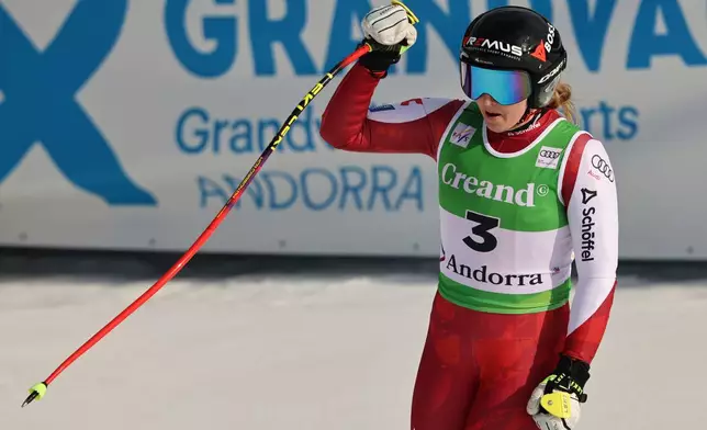 Austria's Nina Ortlieb celebrates at the finish area of an alpine ski, women's World Cup downhill, in Soldeu, Andorra, Friday, February. 27, 2026. (AP Photo/Marco Trovati)