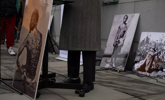 Attorney and founder of Avenging the Ancestors Coalition Michael Coard speaks during a rally celebrating the reinstallation of a slavery exhibit at the President's House Site in Philadelphia on Thursday, Feb. 19, 2026, in Philadelphia. (AP Photo/Joe Lamberti)
