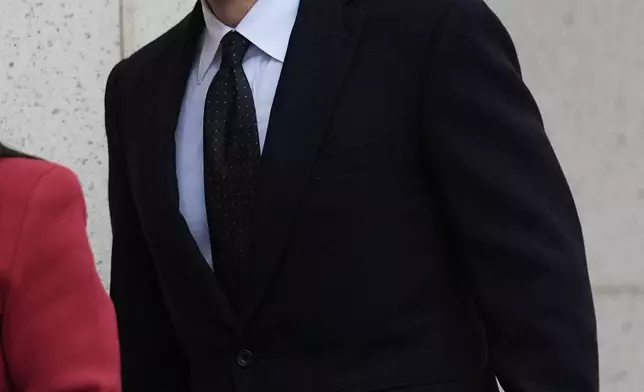 Adam Mosseri, CEO of Instagram, arrives in court to testify in a landmark social media case that seeks to hold tech companies responsible for harms to children, Wednesday, Feb. 11, 2026, in Los Angeles. (AP Photo/Damian Dovarganes)