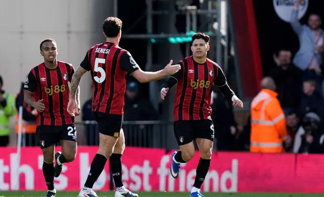 Bournemouth's Evanilson, right, celebrates after scoring his side's first goal during the English Premier League soccer match between AFC Bournemouth and AFC Sunderland in Bournemouth, England, Saturday, Feb. 28, 2026. (Andrew Matthews/PA via AP)